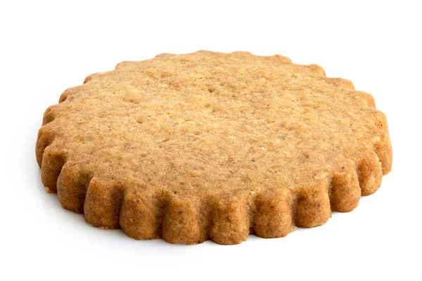 Jedna kulatá perníková sušenka izolovaná na bílém. Zoubkovaný okraj — Stock fotografie