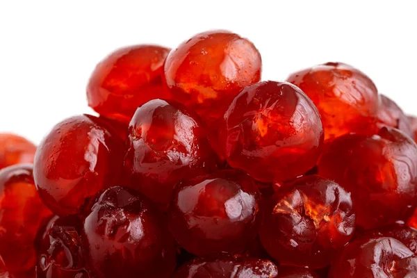 Detalle de una pila de cerezas rojas sobre fondo blanco . — Foto de Stock