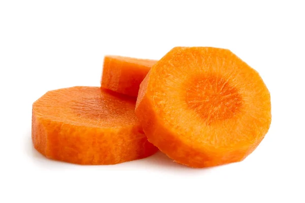Three round slices of peeled carrot isolated on white. — Stock Photo, Image