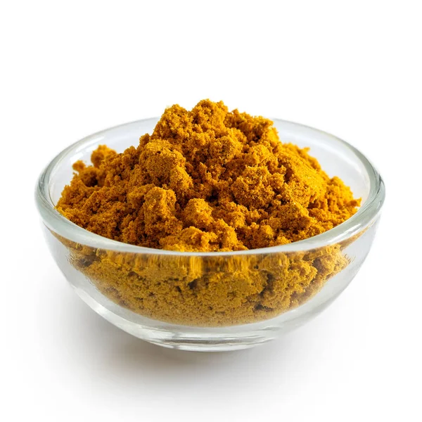 Curry powder in glass bowl isolated on white. — Stock Photo, Image