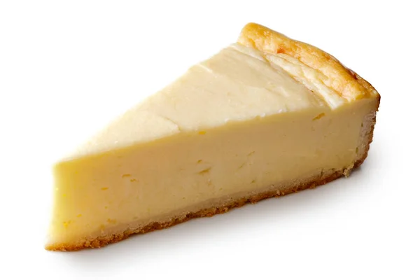 A slice of plain baked cheesecake isolated on white. — Stock Photo, Image