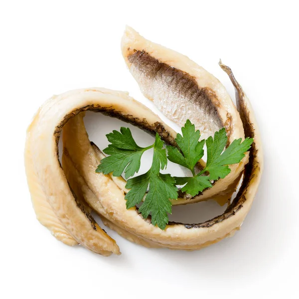 Dois filetes de anchova laminados com salsa de folhas planas isolados em wh — Fotografia de Stock