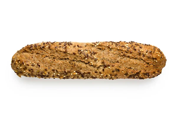 Baguette tradicional de trigo integral con semillas de lino y semillas de sésamo — Foto de Stock