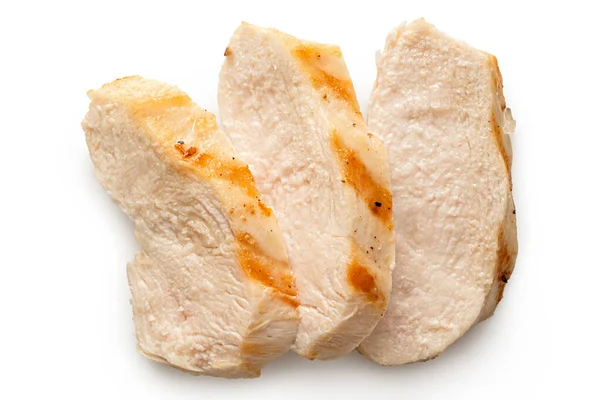 Τρεις φέτες ψητό στήθος κοτόπουλου με σημάδια σχάρα απομονώνονται — Φωτογραφία Αρχείου