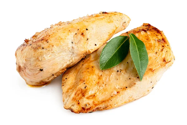 Két egész serpenyőben sült csirkemell friss babérlevél garnissal — Stock Fotó