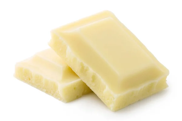 Zwei Quadrate weiße Schokolade isoliert auf weiß. Ecken und Kanten. — Stockfoto