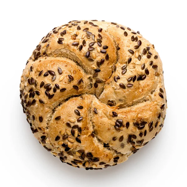 Traditional whole wheat kaiser roll with linseeds and sesame see — Stock Photo, Image