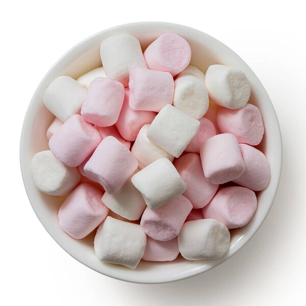 Pink and white mini marshmallows in white ceramic dish isolated 