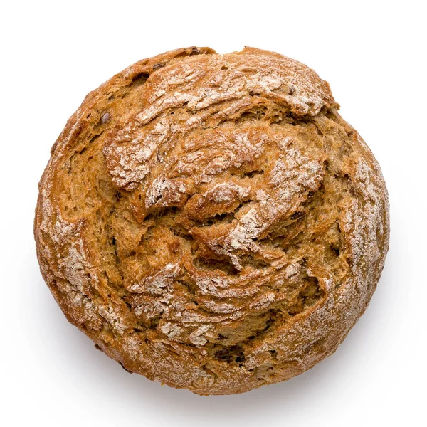 Rolo de pão de trigo inteiro rústico redondo isolado em branco. Vista superior . — Fotografia de Stock