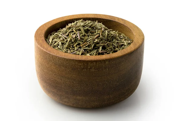 Dried rubbed thyme in a dark wood bowl isolated on white. — Stock Photo, Image