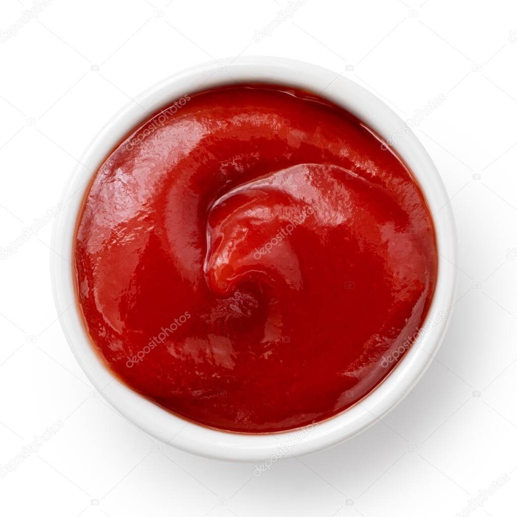 Tomato ketchup in small white ceramic dish isolated on white. To