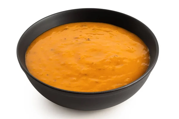 Carrot Coriander Soup Black Ceramic Bowl Isolated White High Angle — Stock Photo, Image