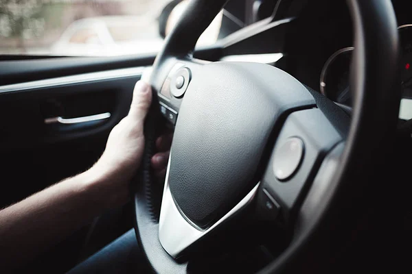 Male Arms Holding Leathern Rudder Car — Stock Photo, Image