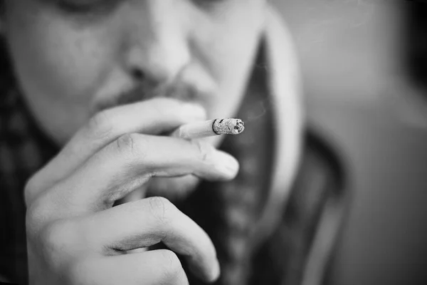 The guy is depressed from nicotine addiction — Stock Photo, Image