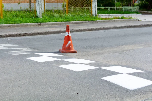 Road repairs, orange cone in front of a speed bump. Line art red set. — Stock Photo, Image