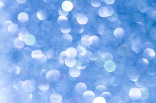 Blauer abstrakter Bokeh-Hintergrund, kreatives Design. Weihnachtsdekoration. — Stockfoto