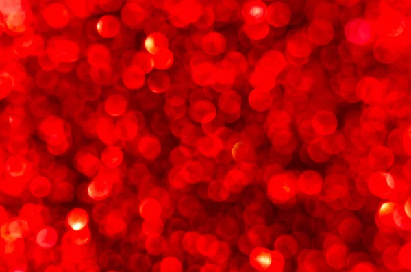 Rote abstrakte Bokeh Hintergrund, kreatives Design. Weihnachtsdekoration. — Stockfoto