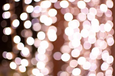 Siyah bir arkaplanda kahverengi soyut bokeh arkaplan. Yaratıcı tasarım.