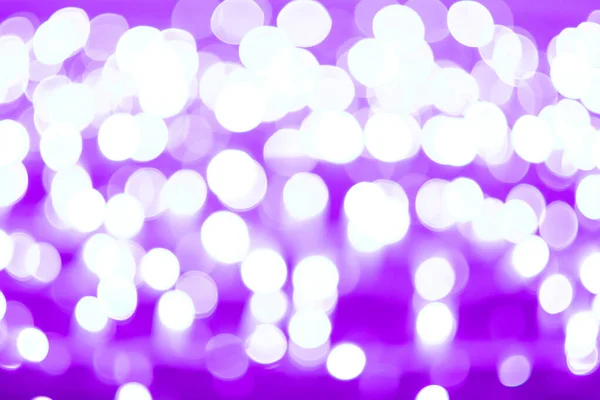 Fond bokeh abstrait violet sur un fond noir. Design créatif. — Photo