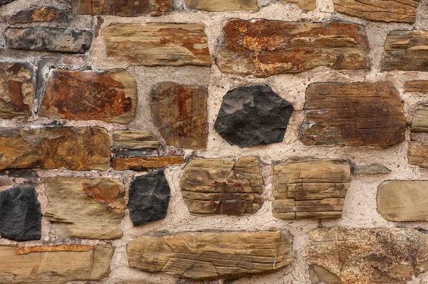 A medieval stone wall.  Abstract background with stone texture. Linz on the Rhine, Germany.