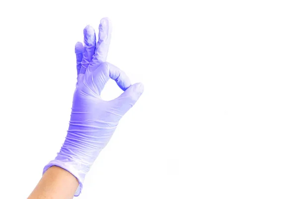 Female hands in white medical gloves showing okay sign. — Stock Photo, Image