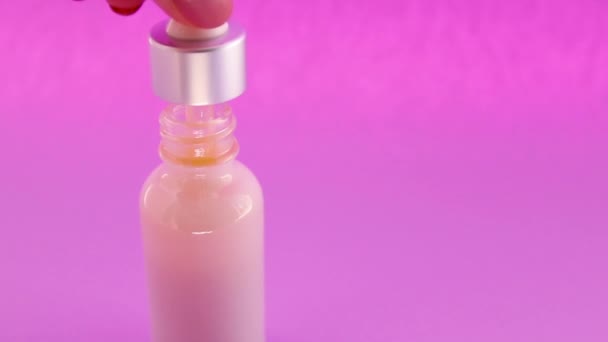 Natural Cosmetic Glass Bottle Pipette Pink Background Care Female Body — Stock Video