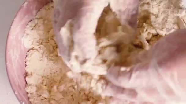 Dough preparation. baker hands kneading dough in flour in glass bowl. — Stock Video