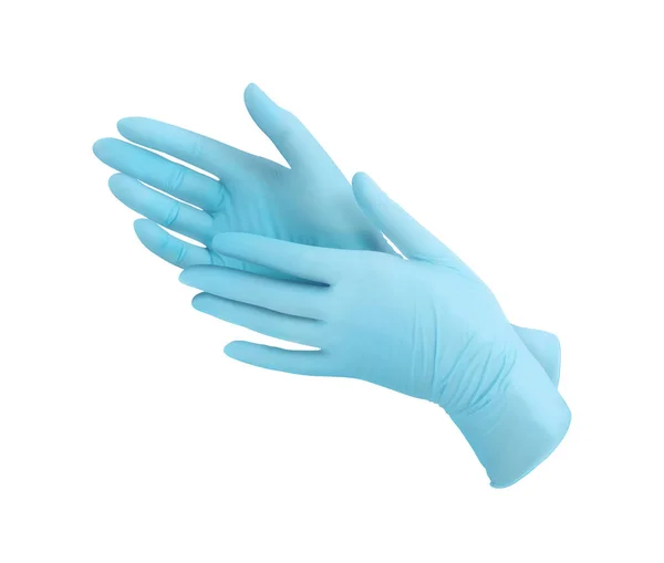 手で白い背景に隔離された2本の青い外科用手袋 ゴム手袋製造 人間の手はラテックス手袋を着用している 防護手袋を着用する医師又は看護師 — ストック写真