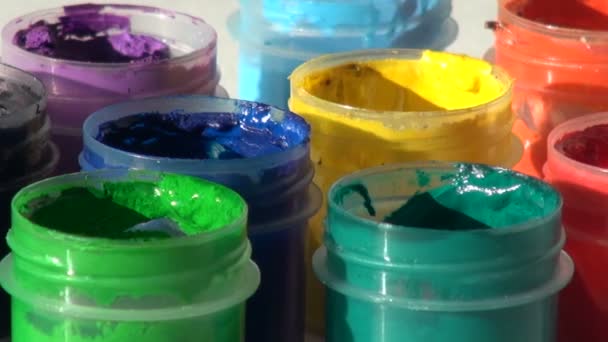 Panorama. movement of Acrylic gouache paint cans — Stock Video