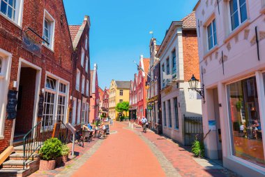 Leer, Germany - May 20, 2018: old town of Leer with unidentified people. Leer, named as the gate of Ostfriesland, has a big amount of historic buildings in a good conservation status clipart