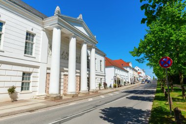 Putbus, Germany - May 09, 2018: theater in Putbus, Ruegen. Putbus was founded 1810 by Prince Wilhelm Malte zu Putbus. He built the town in Classicist style to build a union with the palace and park clipart