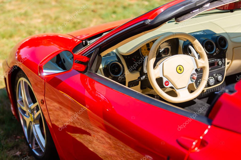 Kerpen, Germany - August 19, 2018: view of a Ferrari sports car with cockpit. Ferrari is an Italian luxury sports car manufacturer based in Maranello, Italy. Founded by Enzo Ferrari 1939