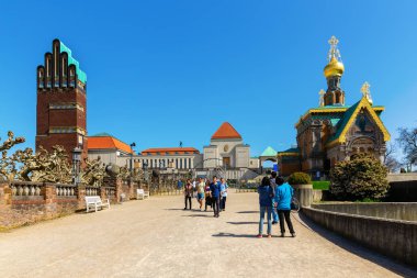 Darmstadt, Germany - April 08, 2018: Mathildenhoehe in Darmstadt, with unidentified people. It is a hill in the city center with an ensemble of historic buildings, a center of art nouveau architecture