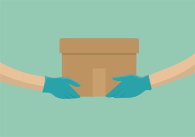 Teslimatçı, paketleri müşteriye teslim ediyor. Elleri tıbbi eldivenlerle korunuyor..