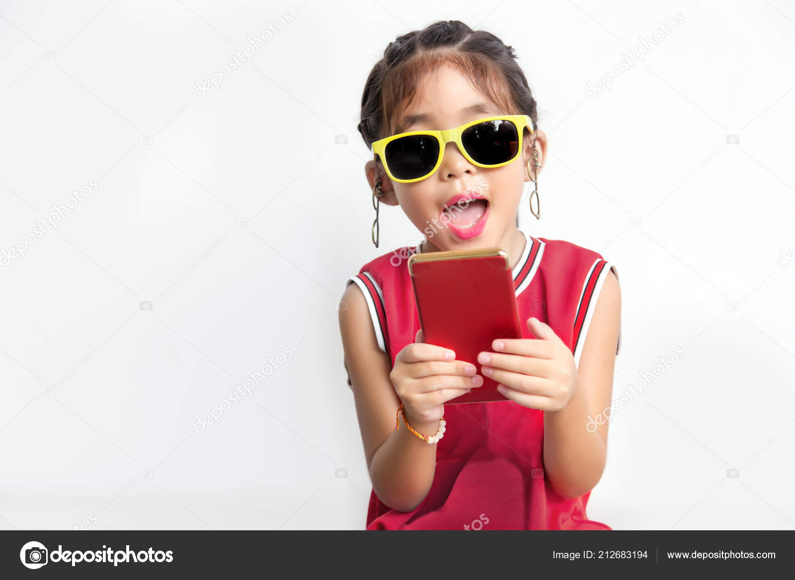 Asian Kid Sport Shirt Sun Glasses Fashion Funny Action Mobile Stock Photo  by ©yanukit 212683194