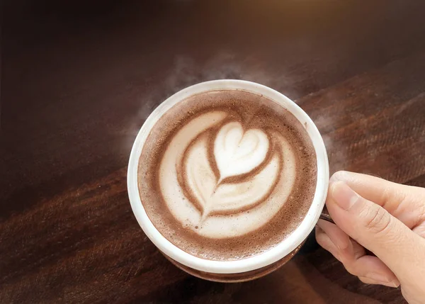 Love hot coffee with smoke by latte art on a cup — Stock Photo, Image