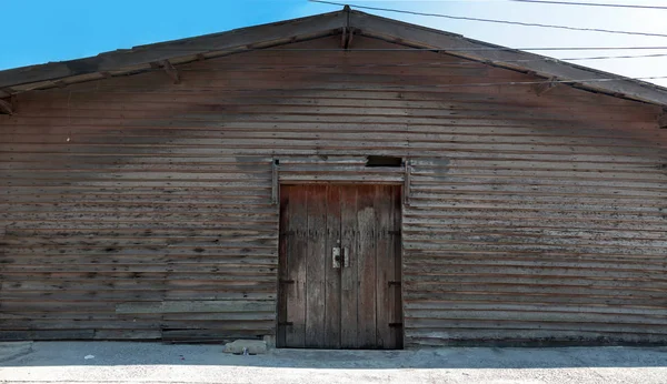 vintage wood cabin building near oceanside exterior