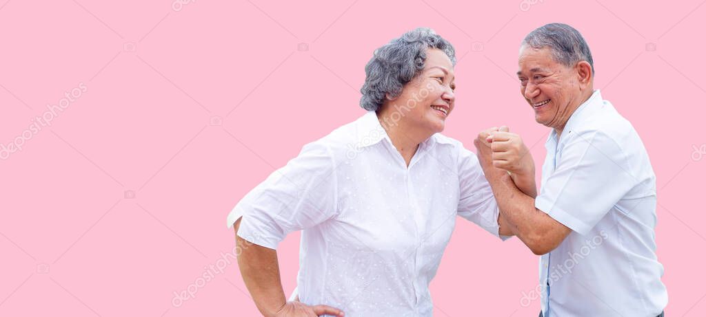 happy senior asian grandparent in dancing action on isolated background in banner size with clipping path for active senoir model.