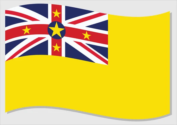 飘扬着纽埃矢量图形的旗帜 摇曳着牛皮旗的图解 纽埃国国旗在风中摇曳是自由和独立的象征 — 图库矢量图片