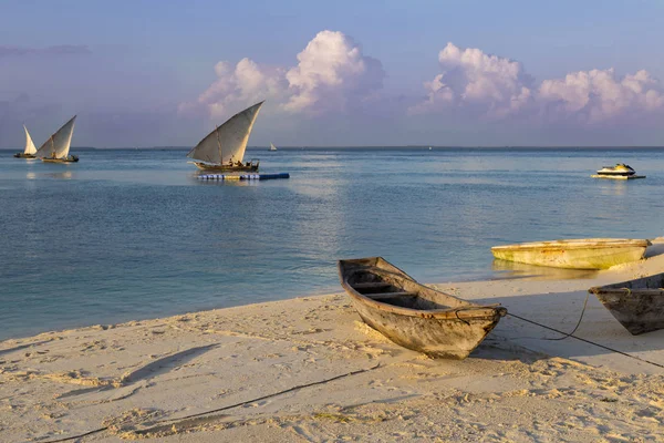 Morning seascape with sailing boats. Coast of  Zanzibar.