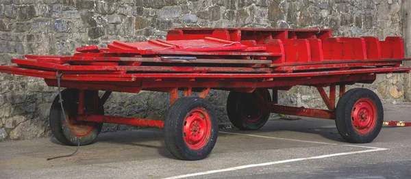 Photo Red Cart Black Wheels Cold Colours Sunlight — Stock Photo, Image