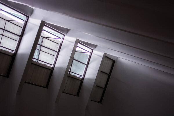 Shadow And Light Through Blinds Window On Wall, Abstract Form Morning Light And Shadow.