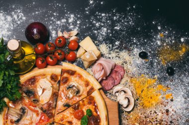 Lezzetli pizza altı farklı tat verir.