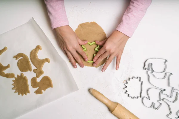 Little Girl Hand Making Traditional Christmas Cookies Raw Dough Cutters Stock Image