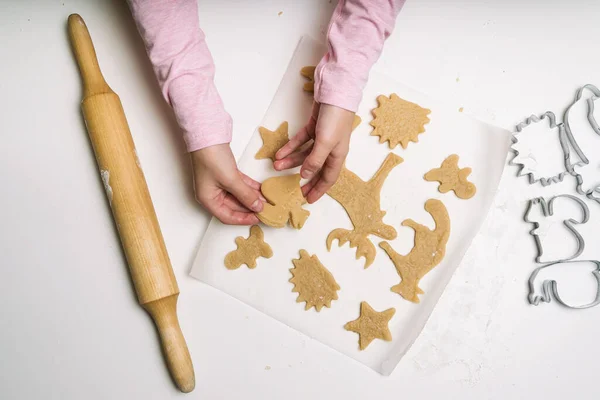 Little Girl Hand Making Traditional Christmas Cookies Raw Dough Cutters Stock Image