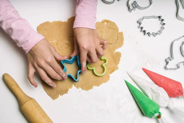 Little Girl Hand Making Traditional Christmas Cookies Raw Dough Cutters Royalty Free Stock Images