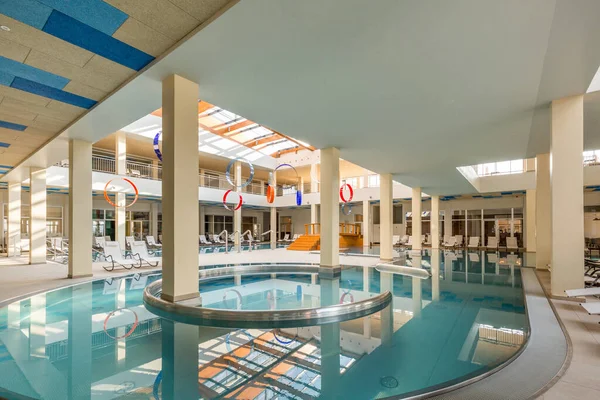 Indoor swimming pool in hotel spa and wellness center