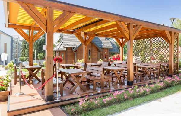 Wooden summer garden restaurant in the beautiful nature