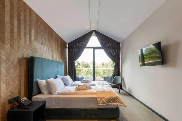 Interior of a luxury hotel bedroom in mountain hotel resort