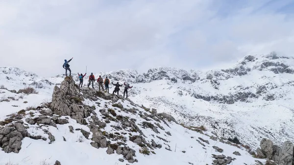 winter walk and achievements of crowded climber group